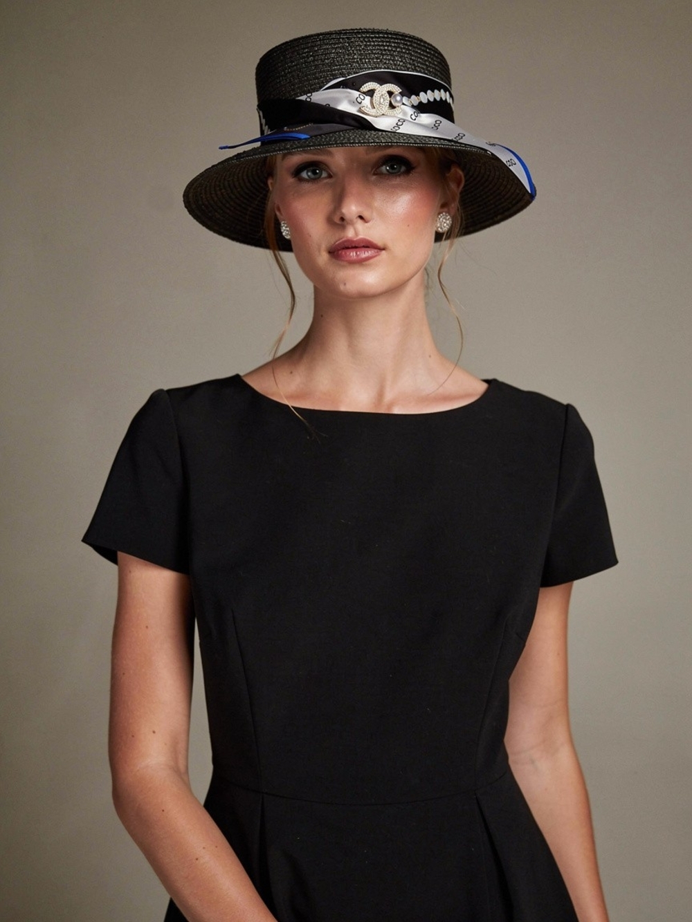 Elegant Black Straw Boater Hat with Patterned Silk Scarf Trim